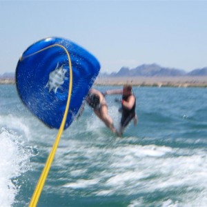 This is what happens when I drive the boat...I end up  sending Brian and Jenna flying off the tube! :D