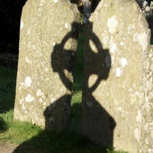 Ireland - shadow of  a celtic cross.